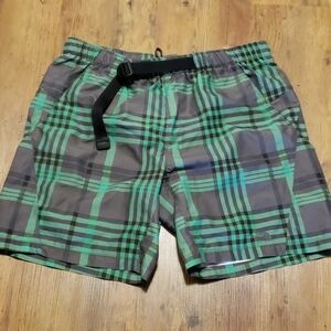 The north face green and gray lined swim trunks